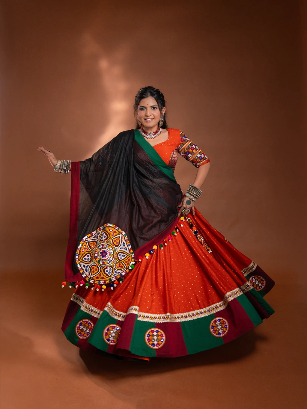 Rust Chaniya Choli with Maroon and Green Border