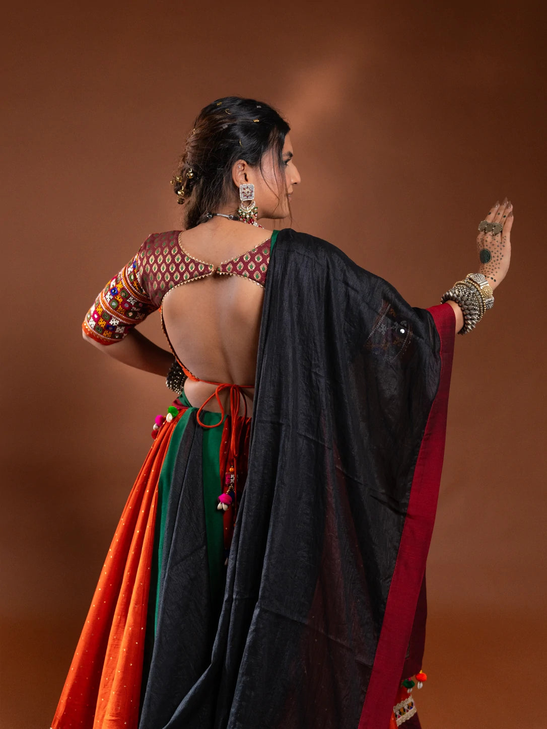 Rust Chaniya Choli with Maroon and Green Border