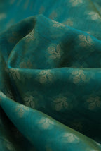 Teal green banarasi cotton butti border saree