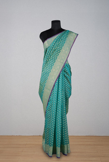 Teal green banarasi cotton butti border saree