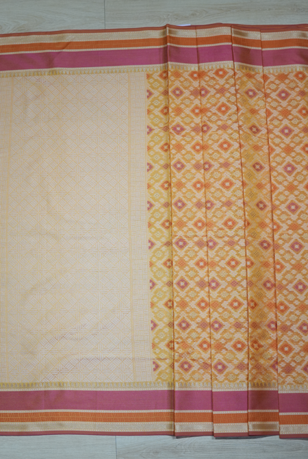 Yellow banarasi cotton patola wave saree