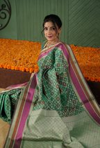 Green banarasi cotton patola wave saree