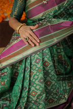 Green banarasi cotton patola wave saree
