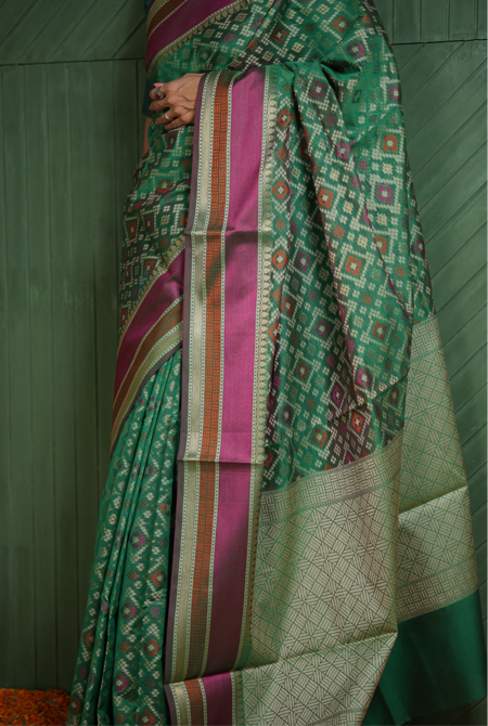 Green banarasi cotton patola wave saree