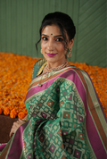 Green banarasi cotton patola wave saree