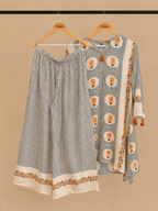 White and blue co-ord set with orange flowers